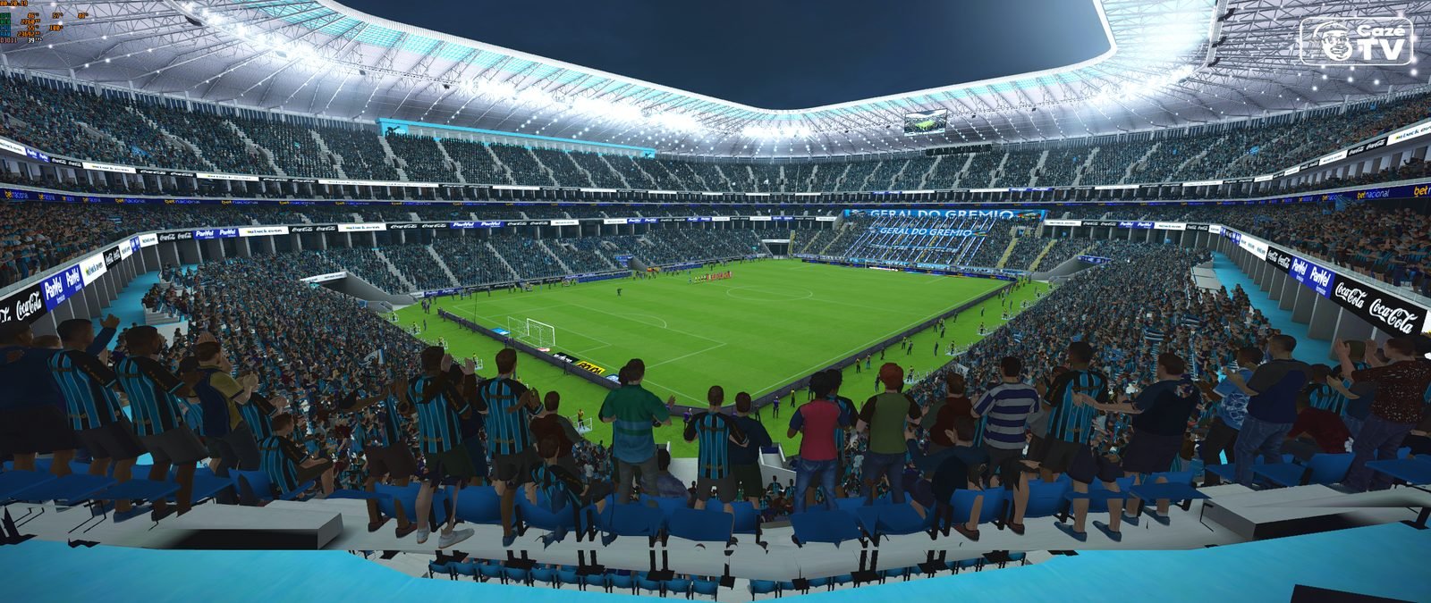 Estádio do Grêmio dentro do FIFA 16, com torcida e placas de campo.